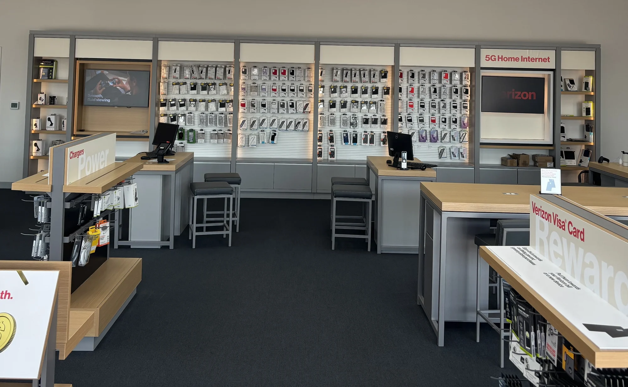 Cellular Sales Dallas remodel — accessory wall, fixtures, and service counters