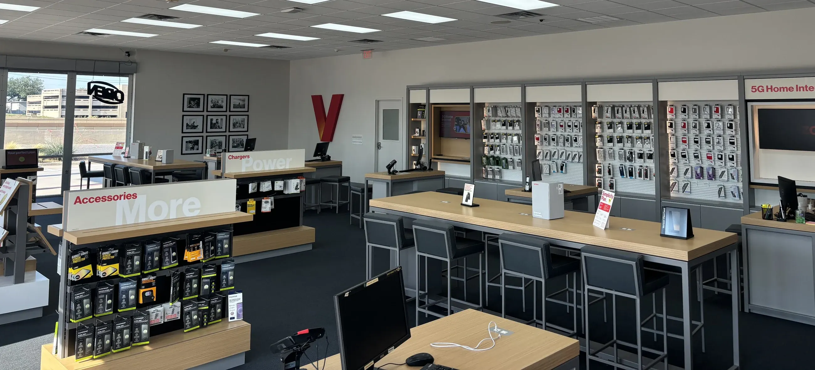 Cellular Sales Dallas remodel — completed retail floor with new fixtures, paint, and flooring