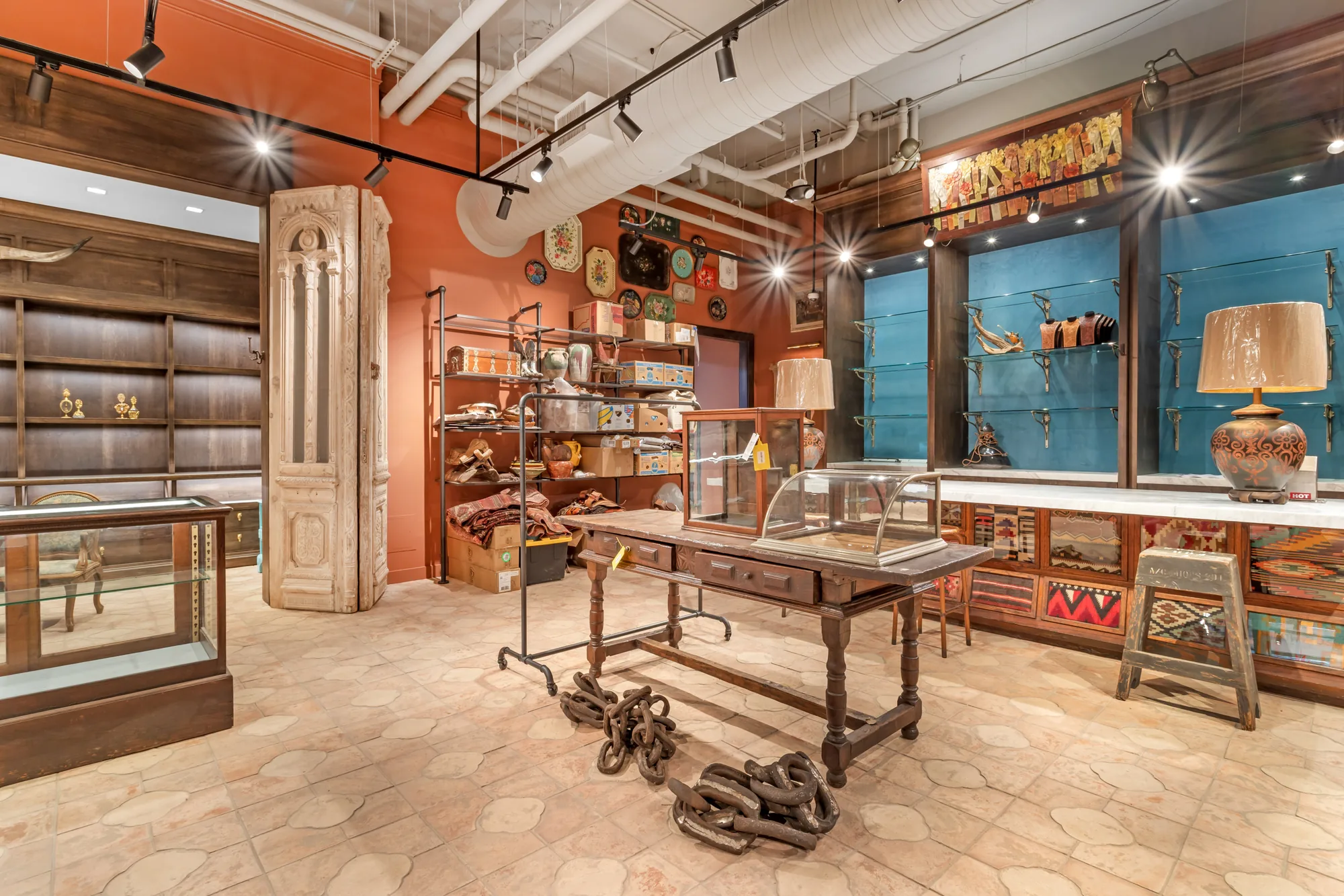 Yellow Rose by Kendra Scott — completed interior with antique millwork, display casework, and kilim-front counter