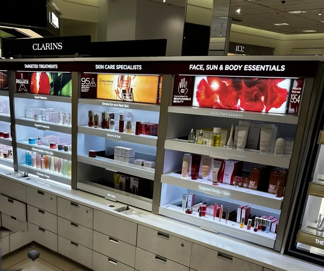 Nordstrom beauty refresh — skincare fixture wall with backlit displays