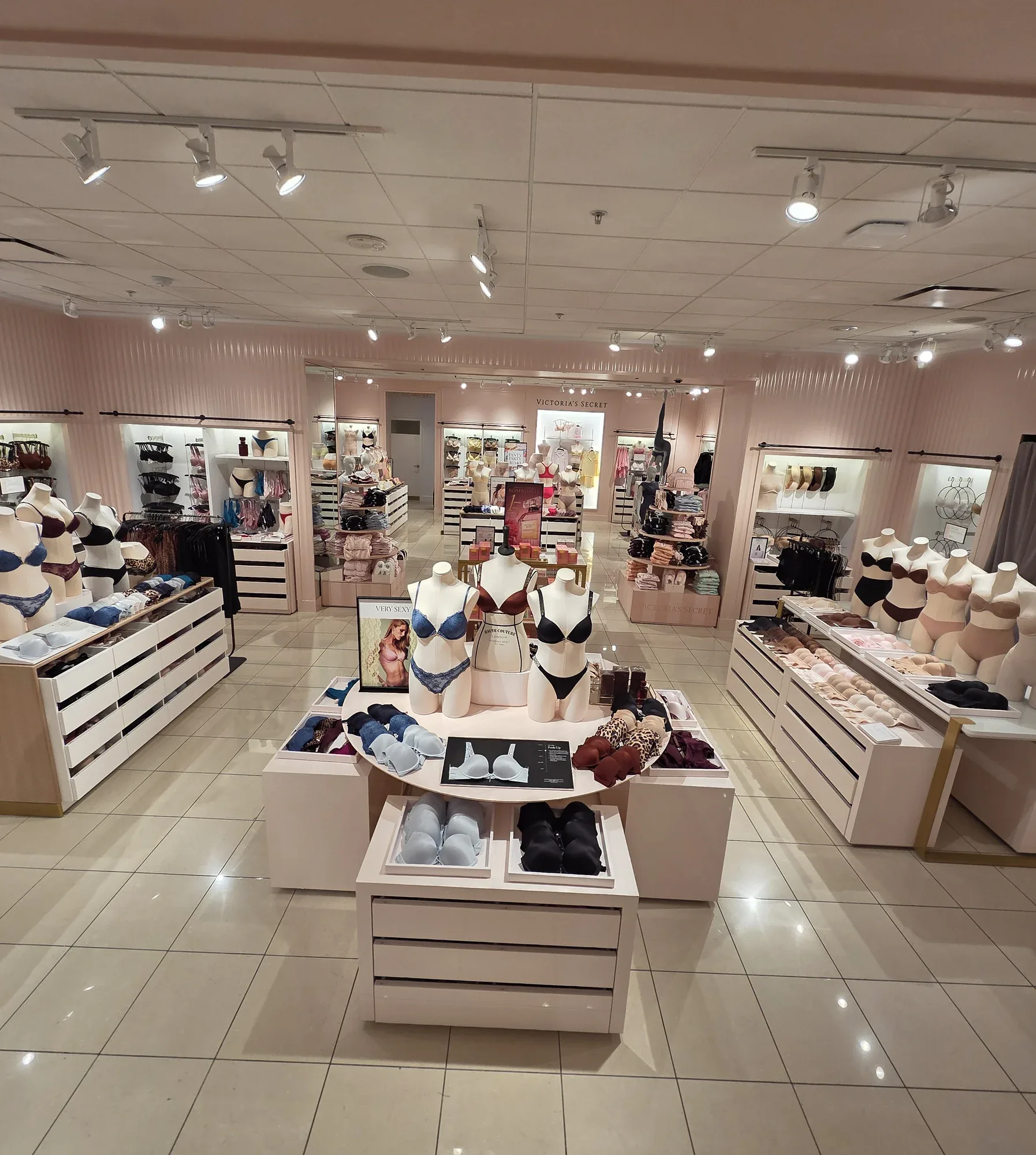 Victoria's Secret completed retail interior — overall sales floor with central display and brand fixtures